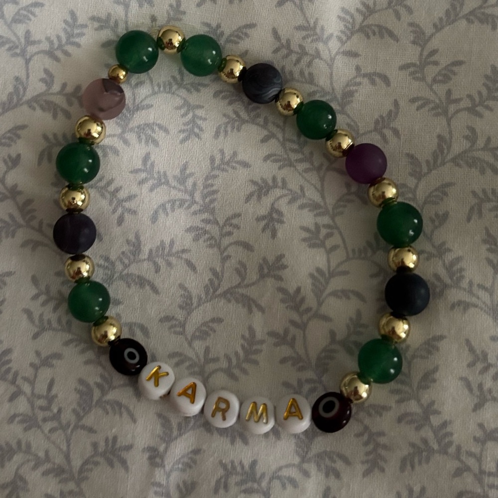 Taylor Swift KARMA and evil eye bracelet